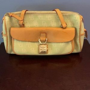 Mint green and tan Dooney and Bourke handbag.